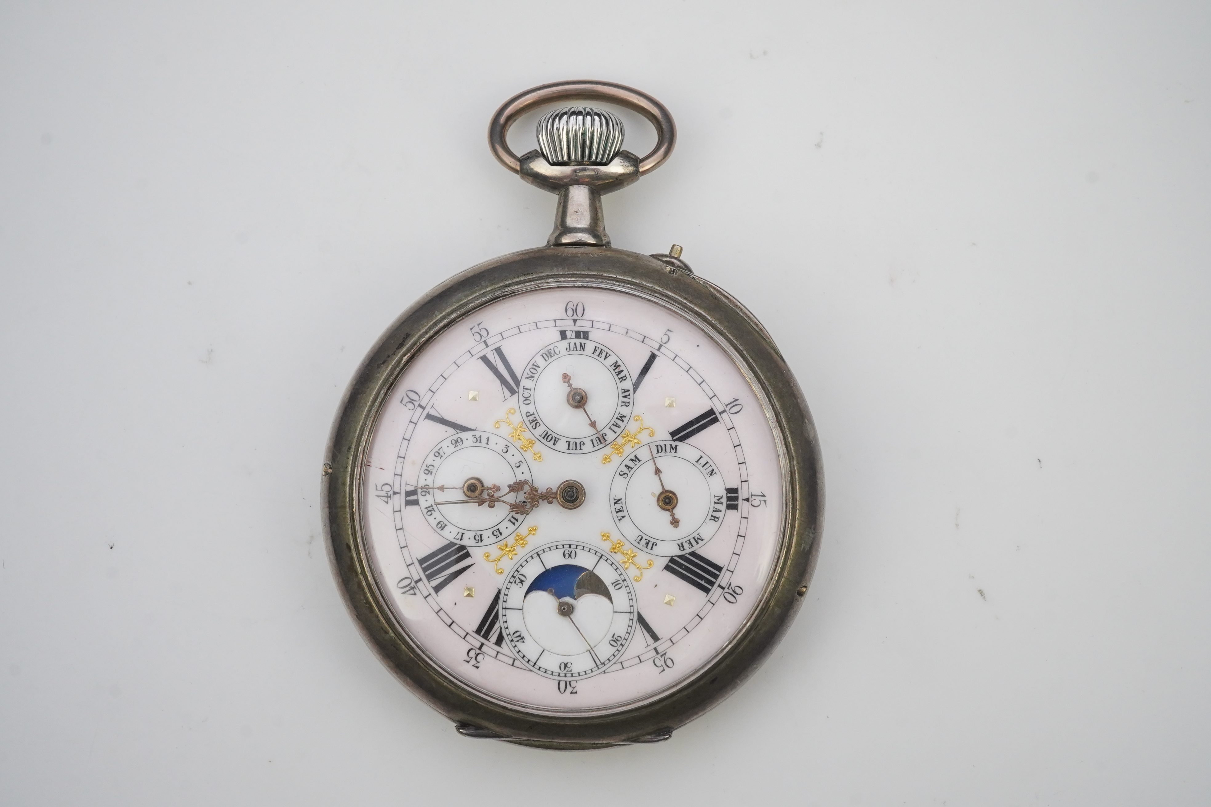 A large early 20th century German 800 standard silver open faced calendar moon phase keyless pocket watch